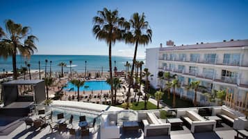 On the beach, sun-loungers, beach umbrellas