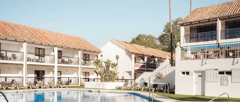 Outdoor pool, pool umbrellas, pool loungers