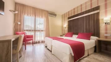 Een minibar, een bureau, geluiddichte muren, gratis wifi