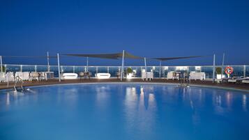 Outdoor pool, open noon to 6:00 PM, sun loungers