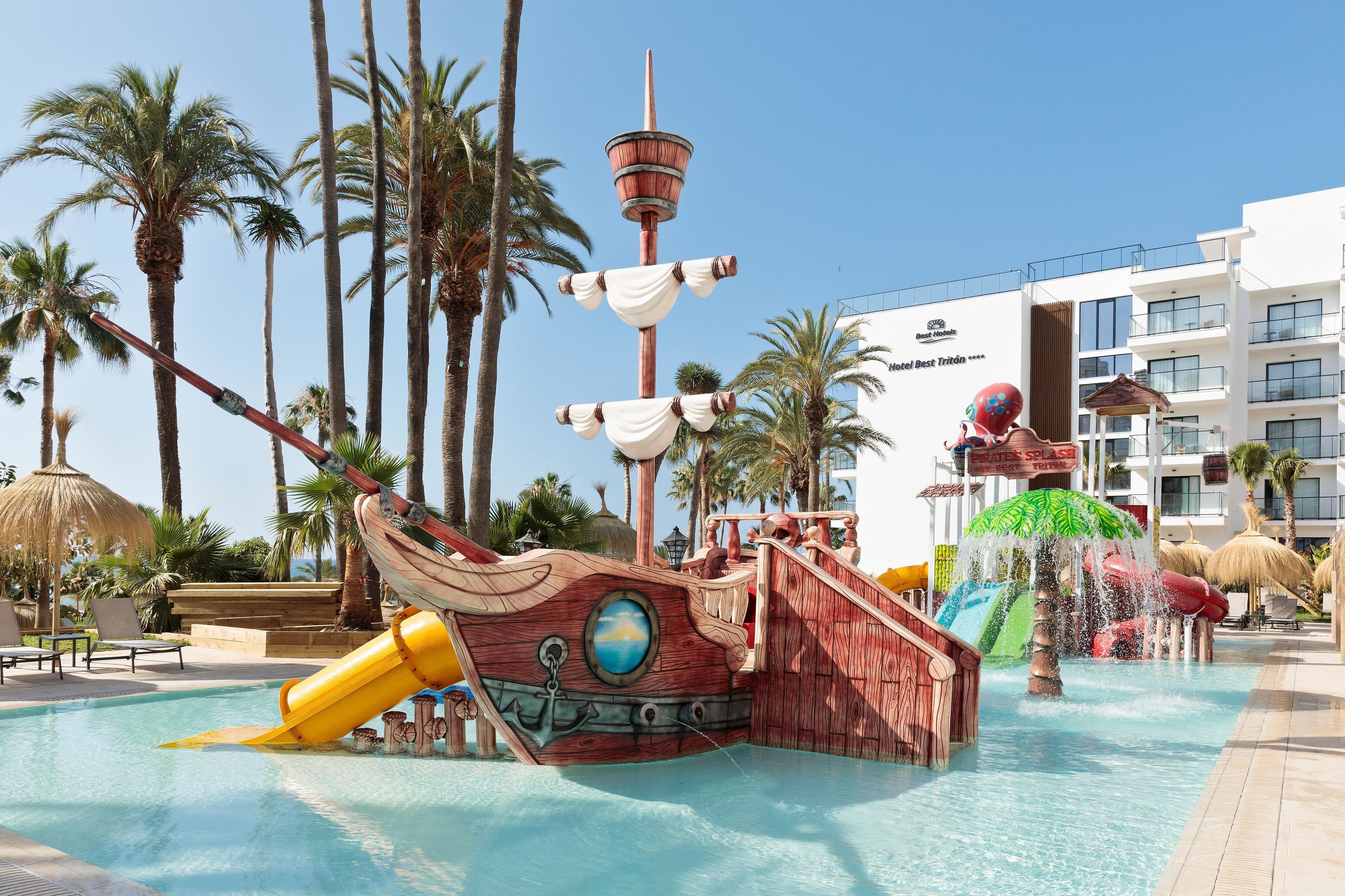 A pirate-themed water park with slides and a ship structure.