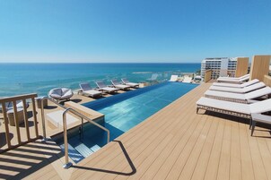Outdoor pool, pool umbrellas, pool loungers
