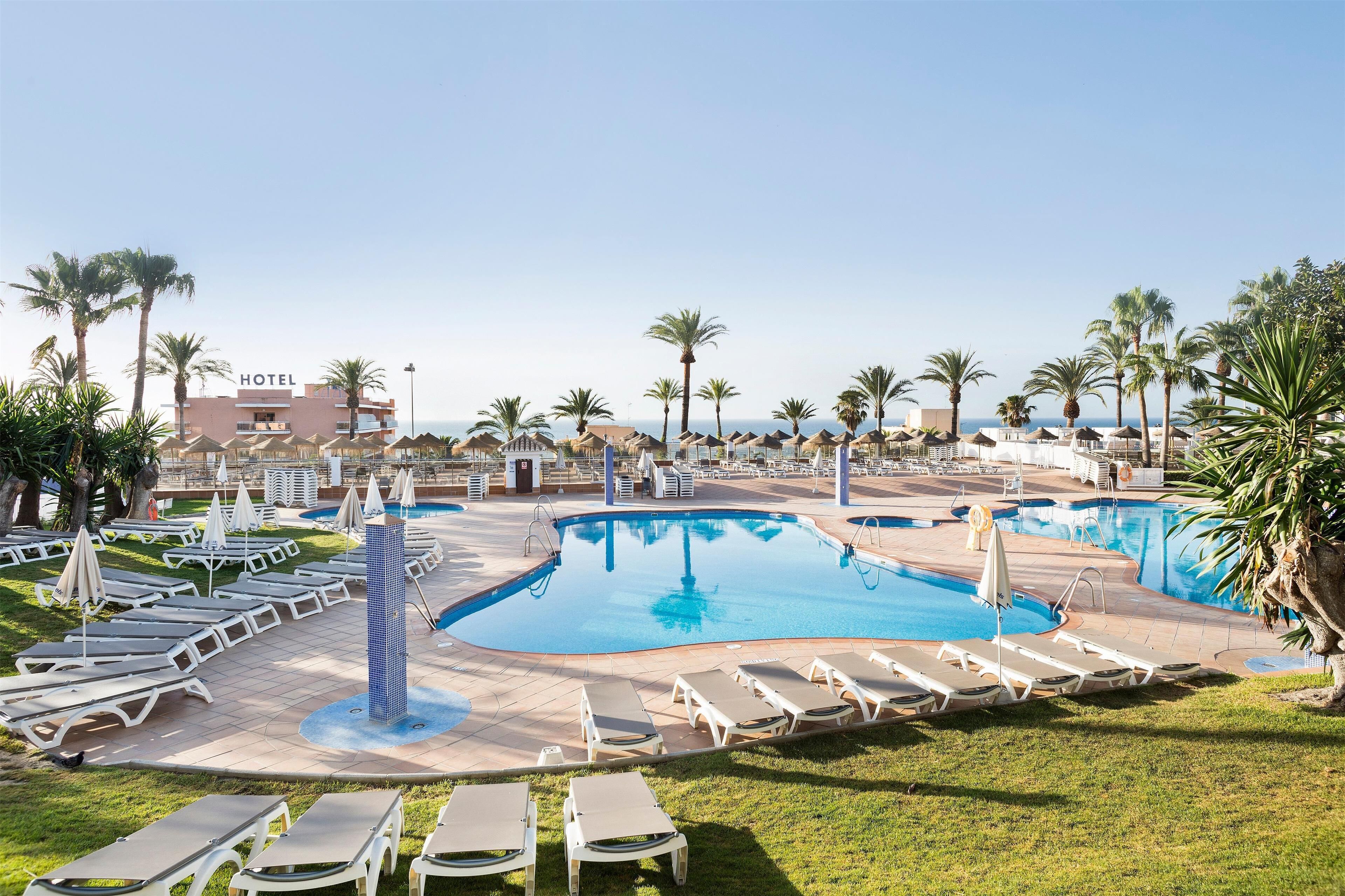 2 outdoor pools, pool umbrellas, pool loungers