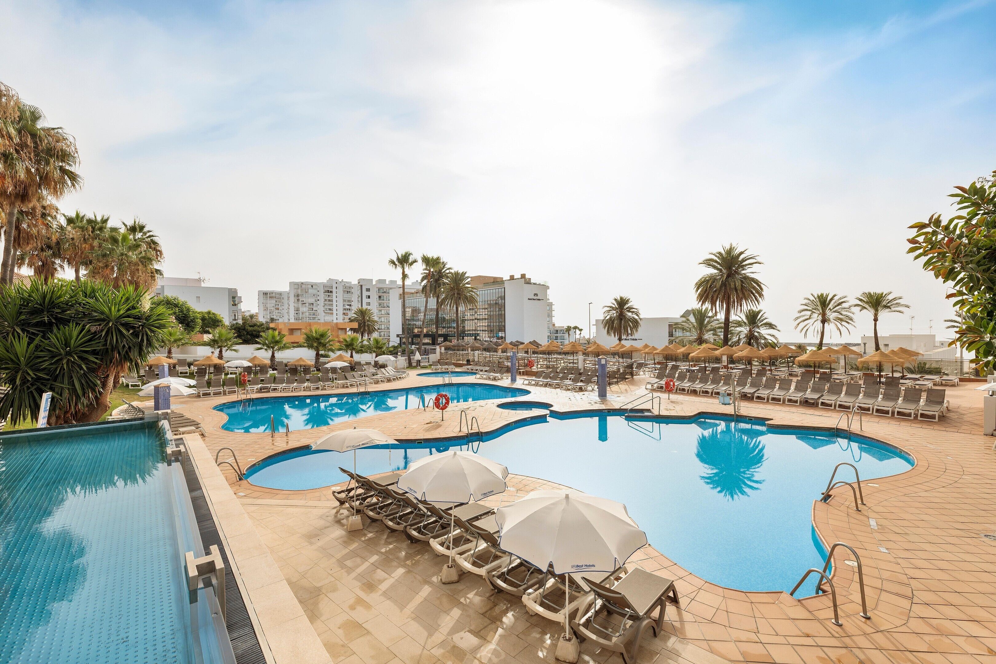 2 outdoor pools, pool umbrellas, sun loungers