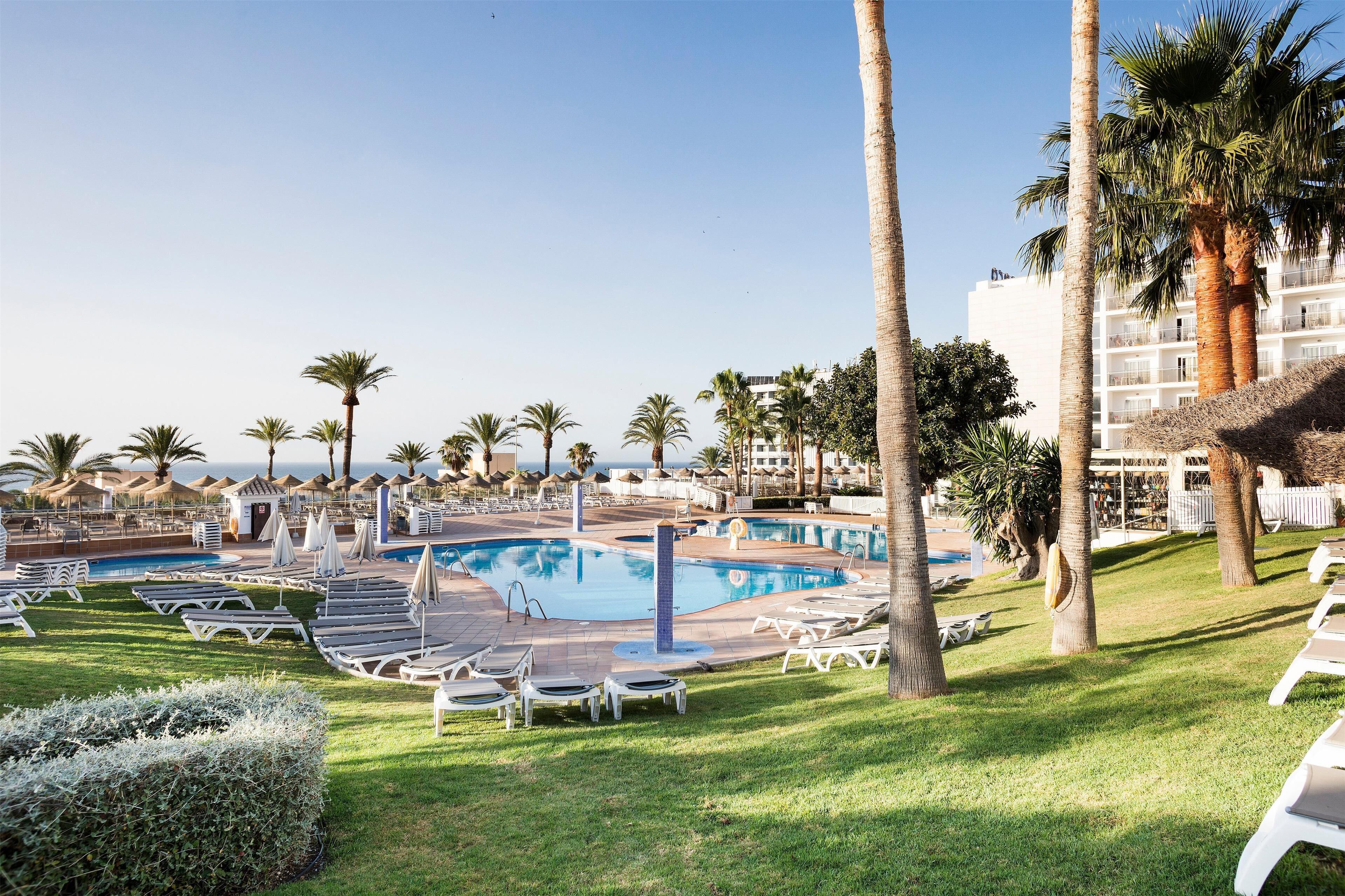 2 outdoor pools, pool umbrellas, pool loungers