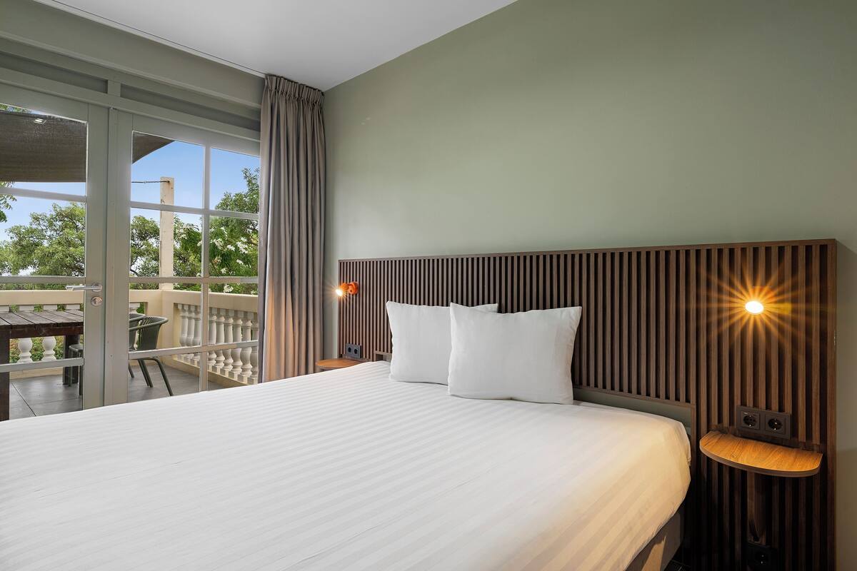 Habitación doble Deluxe | Ropa de cama de alta calidad y minibar