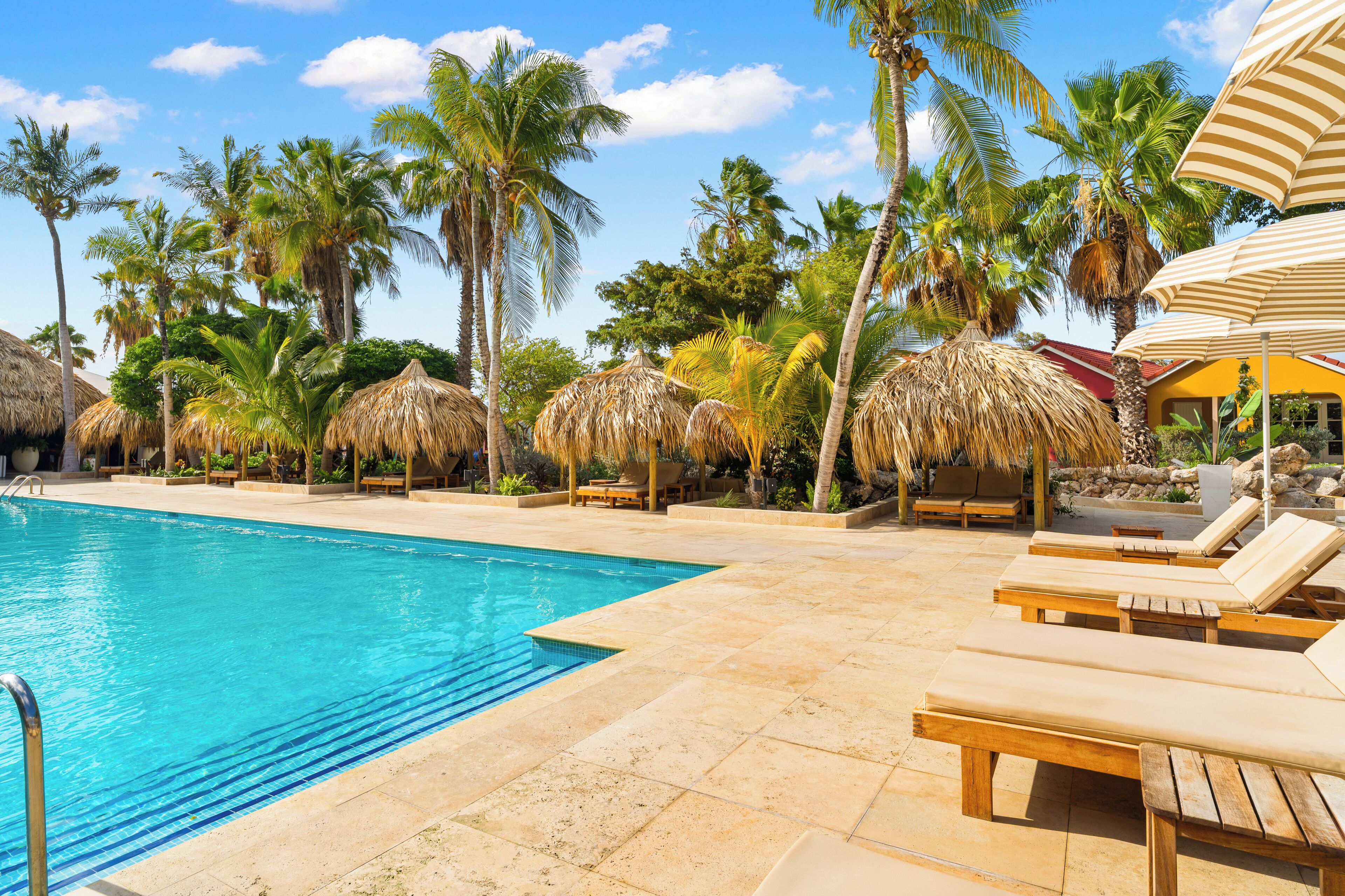 2 outdoor pools, free pool cabanas, pool umbrellas