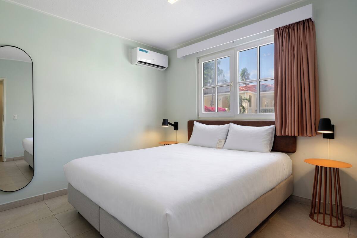 Premium bedding, down duvets, minibar, in-room safe