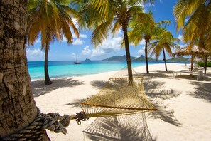 Private beach, white sand, sun-loungers, beach umbrellas