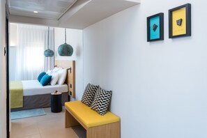 Suite Deluxe | Caixa forta a l'habitació i mobiliari individual 