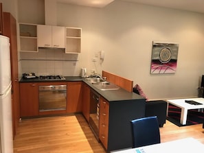 Full-size fridge, microwave, oven, stovetop