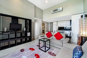 1 Bedroom Superior Apartment | Living area | 32-inch LCD TV with digital channels, TV, DVD player - ULTIQA Little Collins (Melbourne)