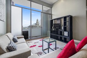 1 Bedroom Superior Apartment | Living area | 32-inch LCD TV with digital channels, TV, DVD player - ULTIQA Little Collins (Melbourne)