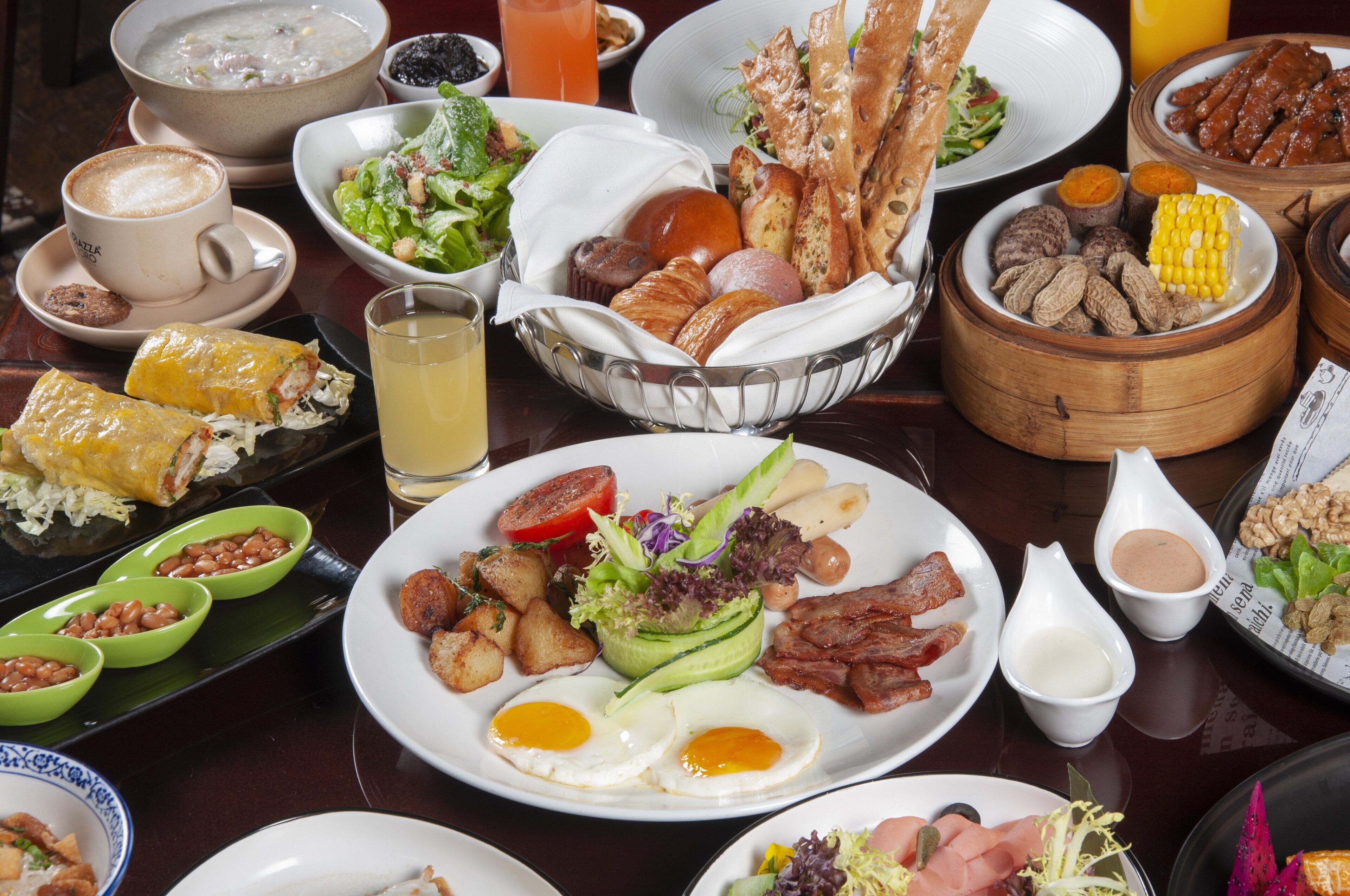 A variety of breakfast dishes including eggs, bacon, and toast.