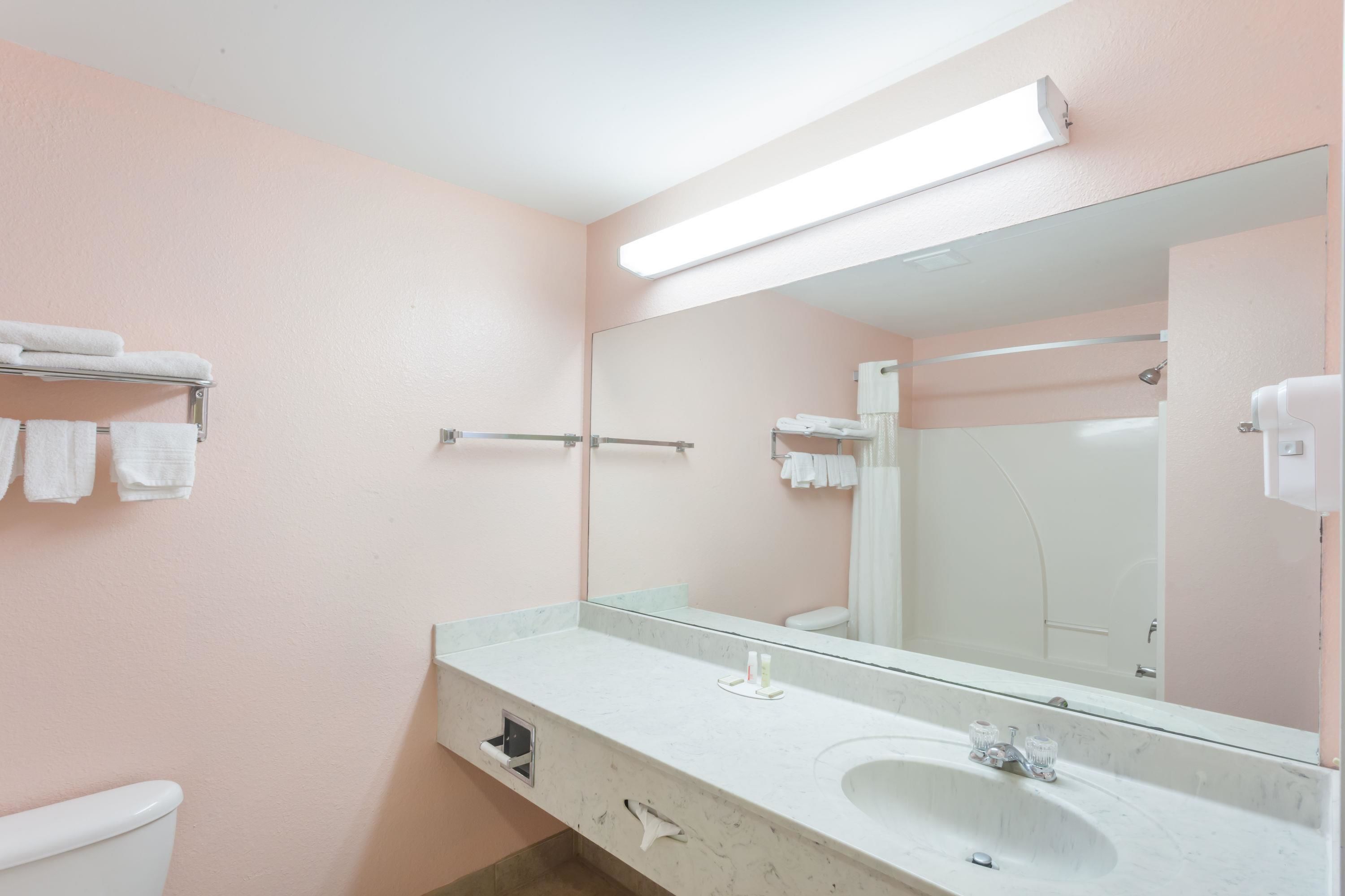 combined shower/bathtub, free toiletries, hair dryer, towels