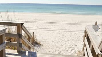 Private beach, white sand, sun loungers, beach umbrellas