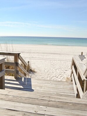 Private beach, white sand, sun loungers, beach umbrellas