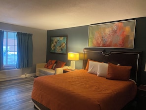 Deluxe Room | Down comforters, desk, laptop workspace, free WiFi