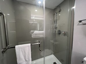 Premium bedding, desk, laptop workspace, blackout curtains