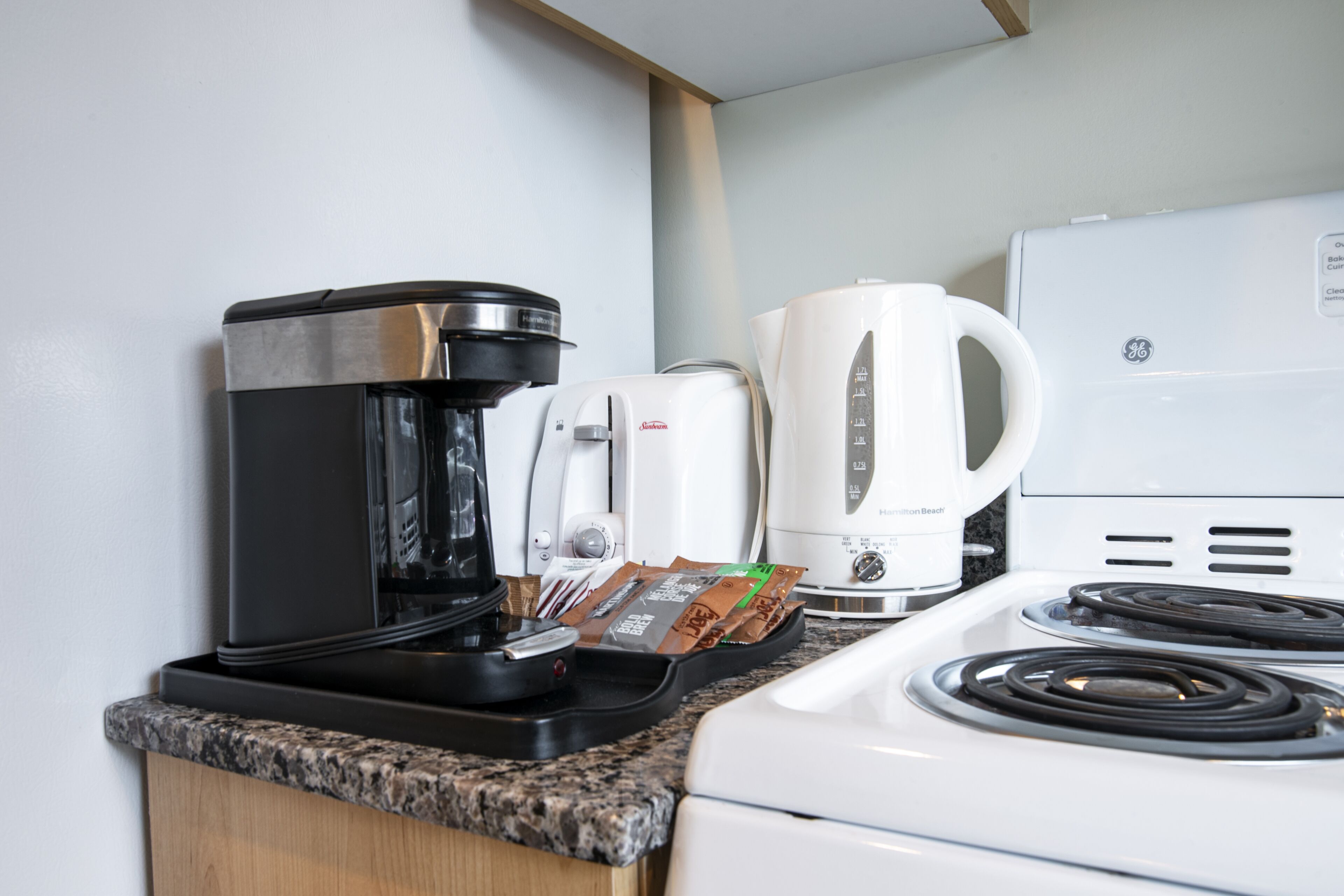 full-sized fridge, microwave, oven, stovetop