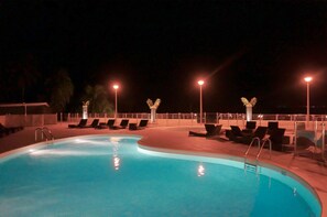 Outdoor pool, pool umbrellas, sun loungers