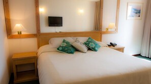 Roba de llit d'alta qualitat, minibar i caixa forta a l'habitació 