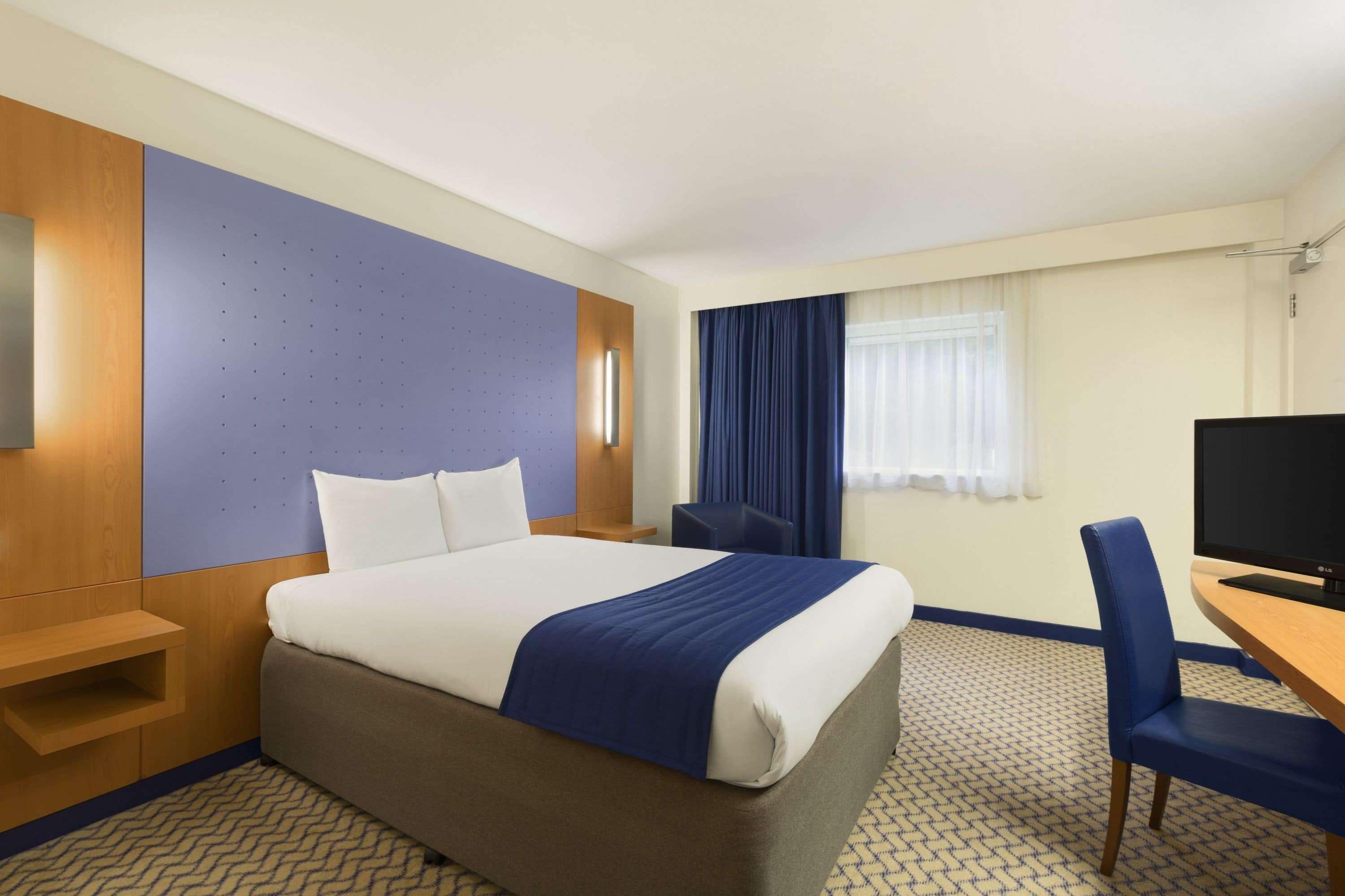 Desk, laptop workspace, blackout drapes, free WiFi