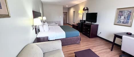 Room, 1 King Bed, Non Smoking, Jetted Tub | Desk, iron/ironing board, Internet, bed sheets