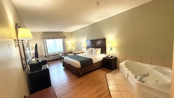 Camera, 1 letto king, non fumatori, idromassaggio | Una scrivania, ferro/asse da stiro, Internet, lenzuola