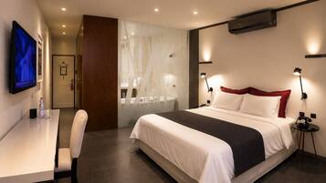 Premium bedding, down duvets, minibar, in-room safe