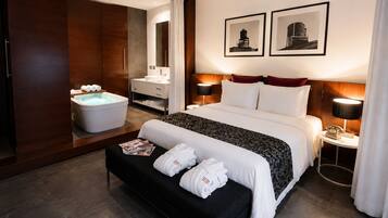 Ropa de cama de alta calidad, cubrecamas y minibar