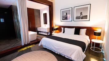 Premium bedding, down comforters, minibar, in-room safe