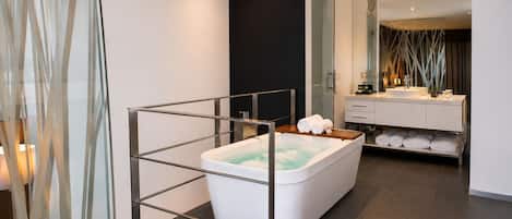 Deluxe Duplex, Tower | Bathroom | Combined shower/bathtub, jetted bath, rainfall showerhead
