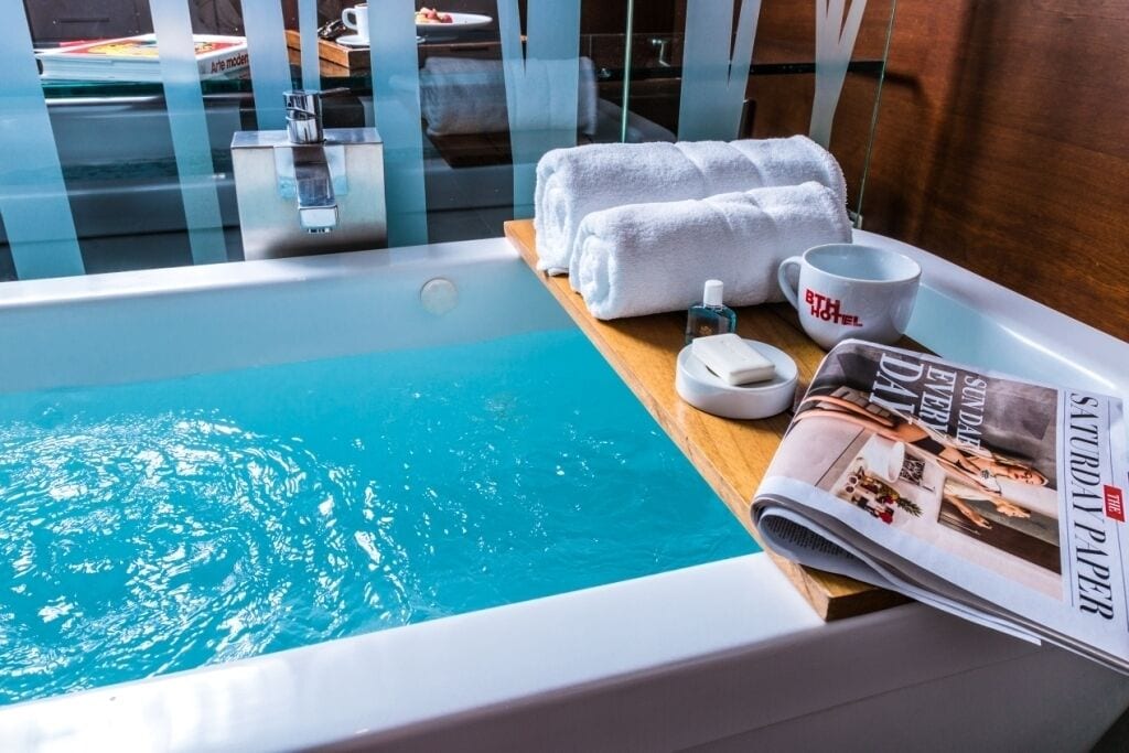 business room | bathroom | combined shower/bathtub, jetted bath, rainfall showerhead