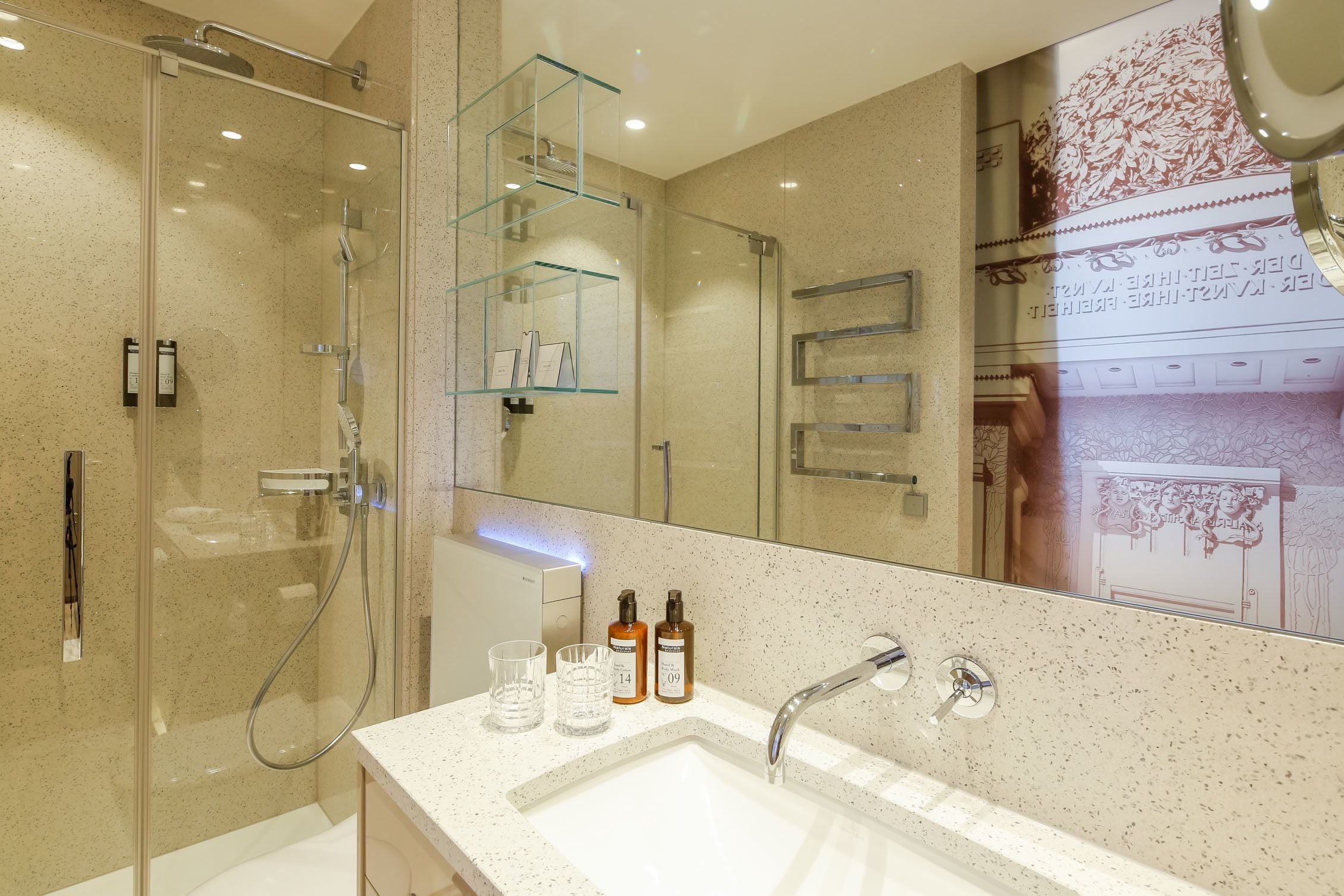 small superior room | bathroom | rainfall showerhead, designer toiletries, hair dryer, bathrobes