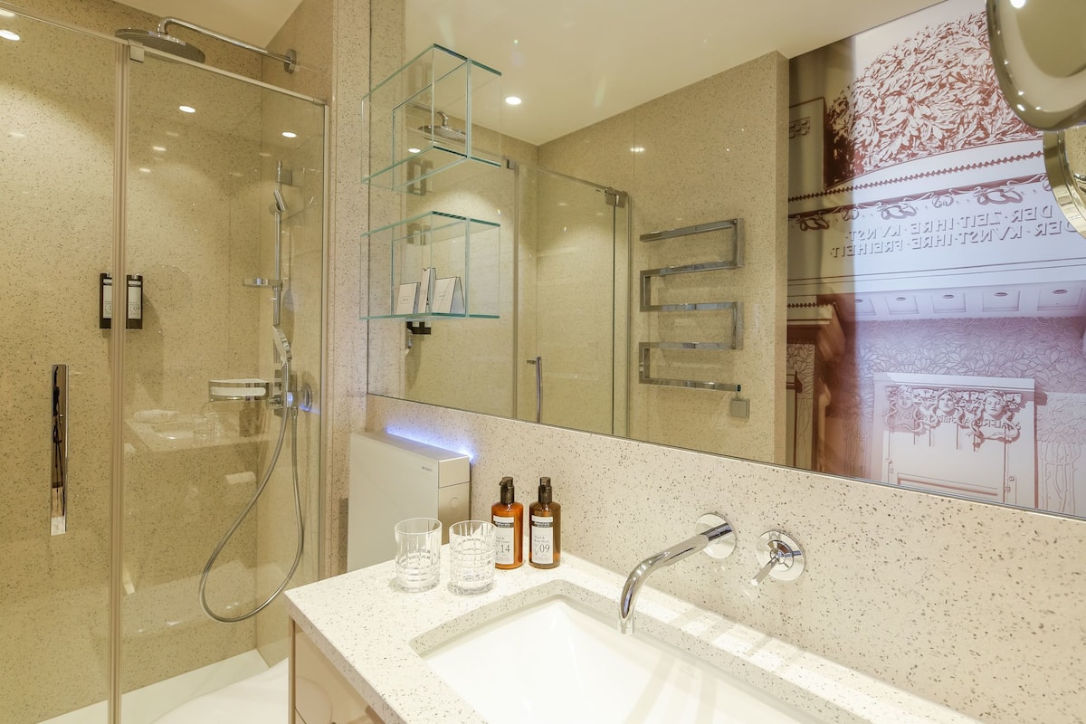 small superior room | bathroom | rainfall showerhead, designer toiletries, hair dryer, bathrobes