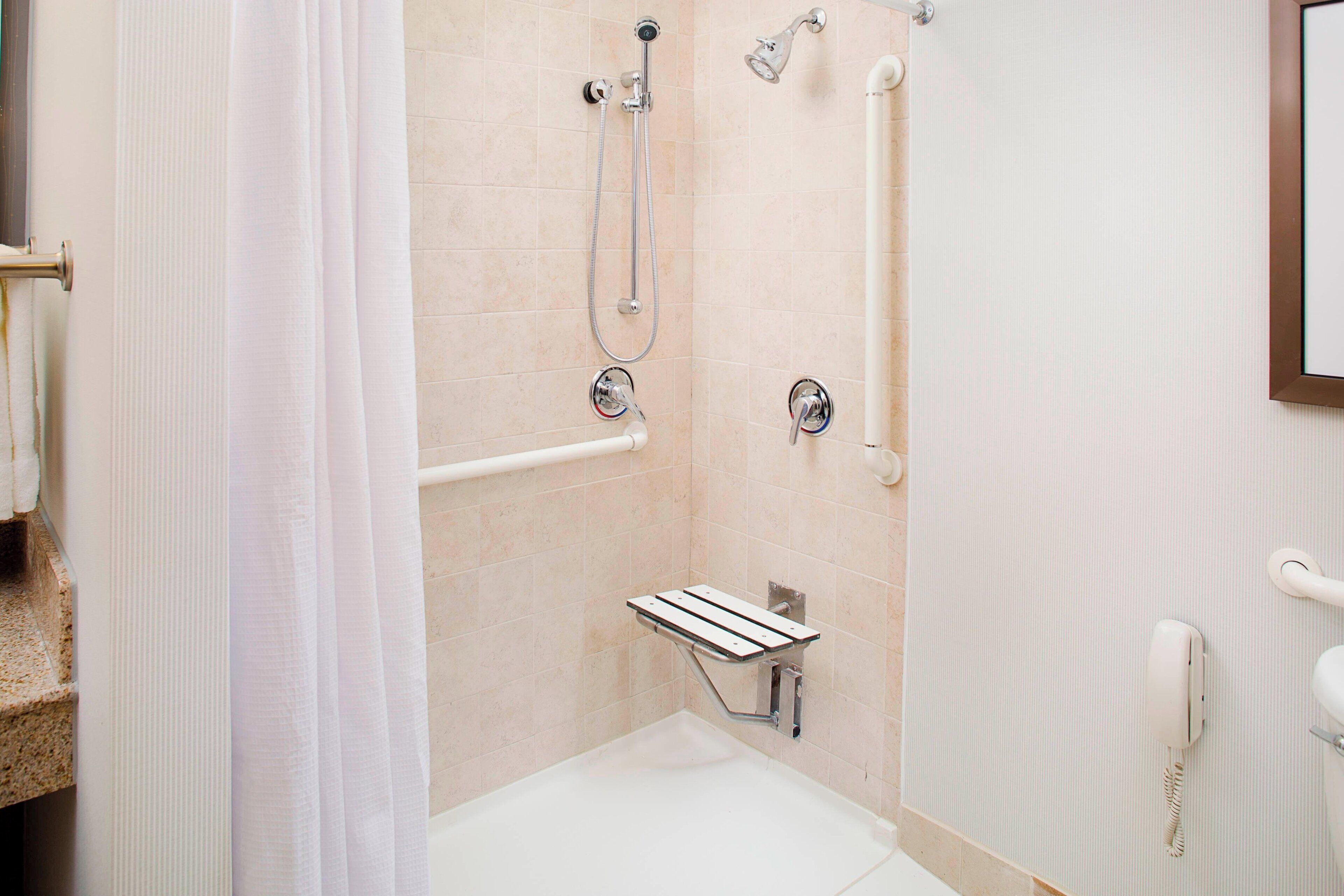 combined shower/bathtub, free toiletries, hair dryer, towels