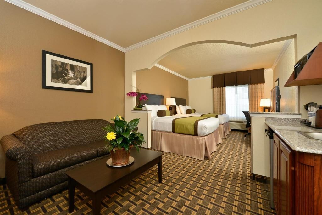 Pillowtop beds, desk, laptop workspace, blackout drapes