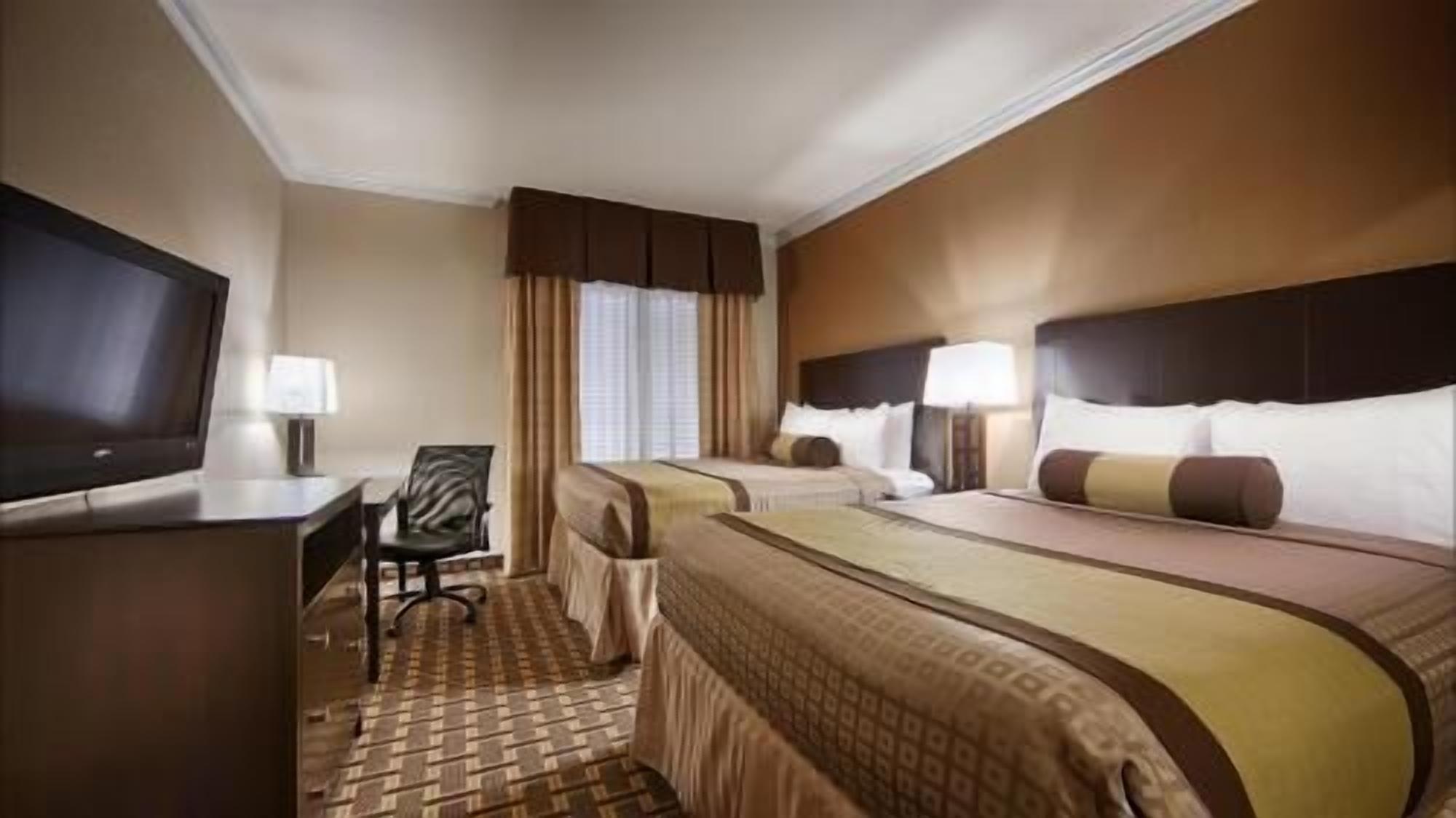 Pillowtop beds, desk, laptop workspace, blackout drapes