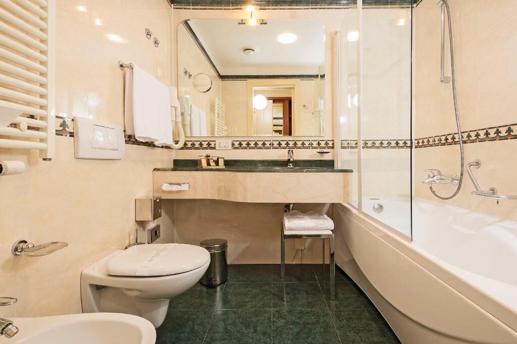 shower, hair dryer, slippers, bidet