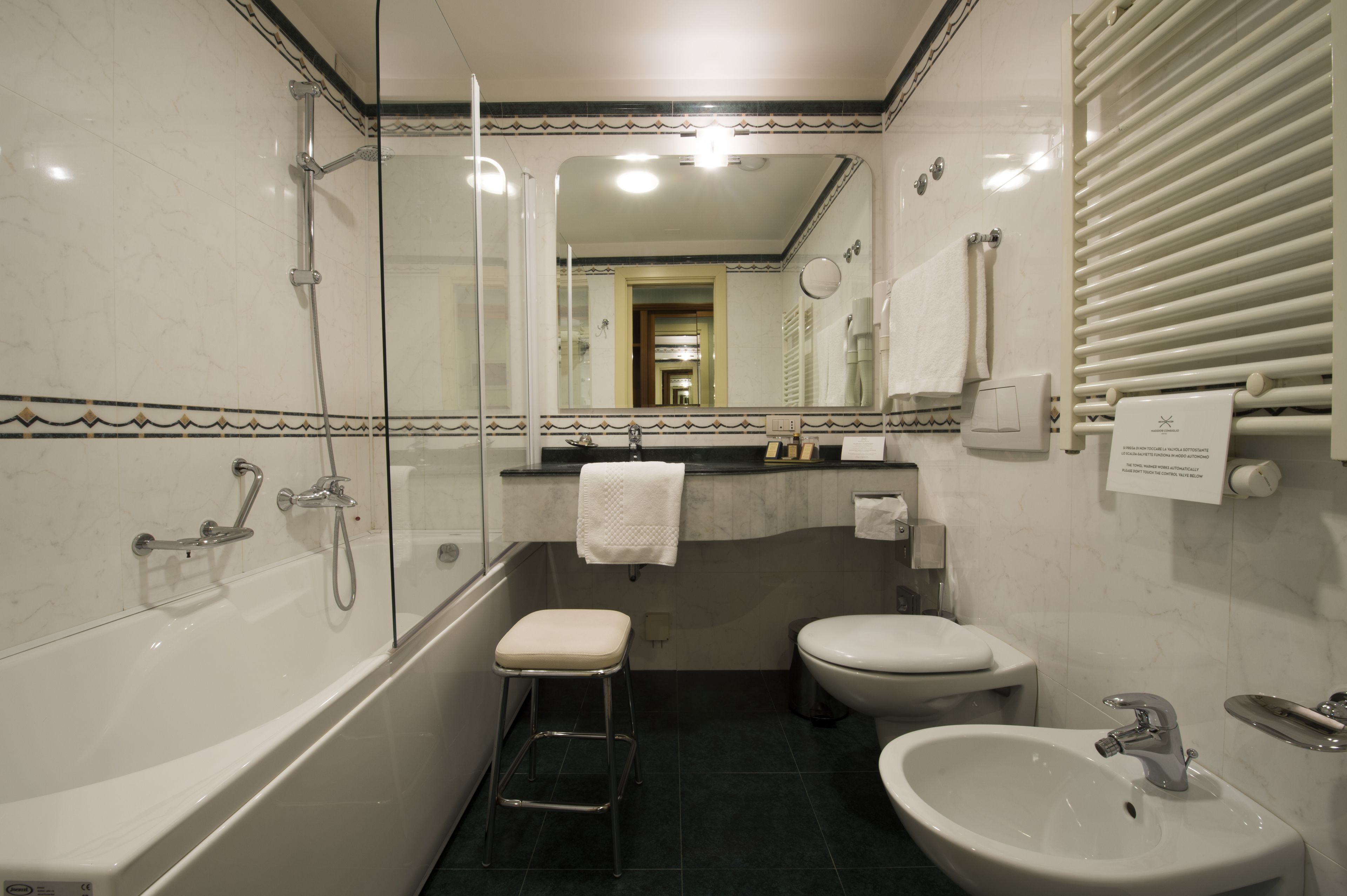 shower, hair dryer, slippers, bidet