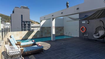 Outdoor pool, sun loungers