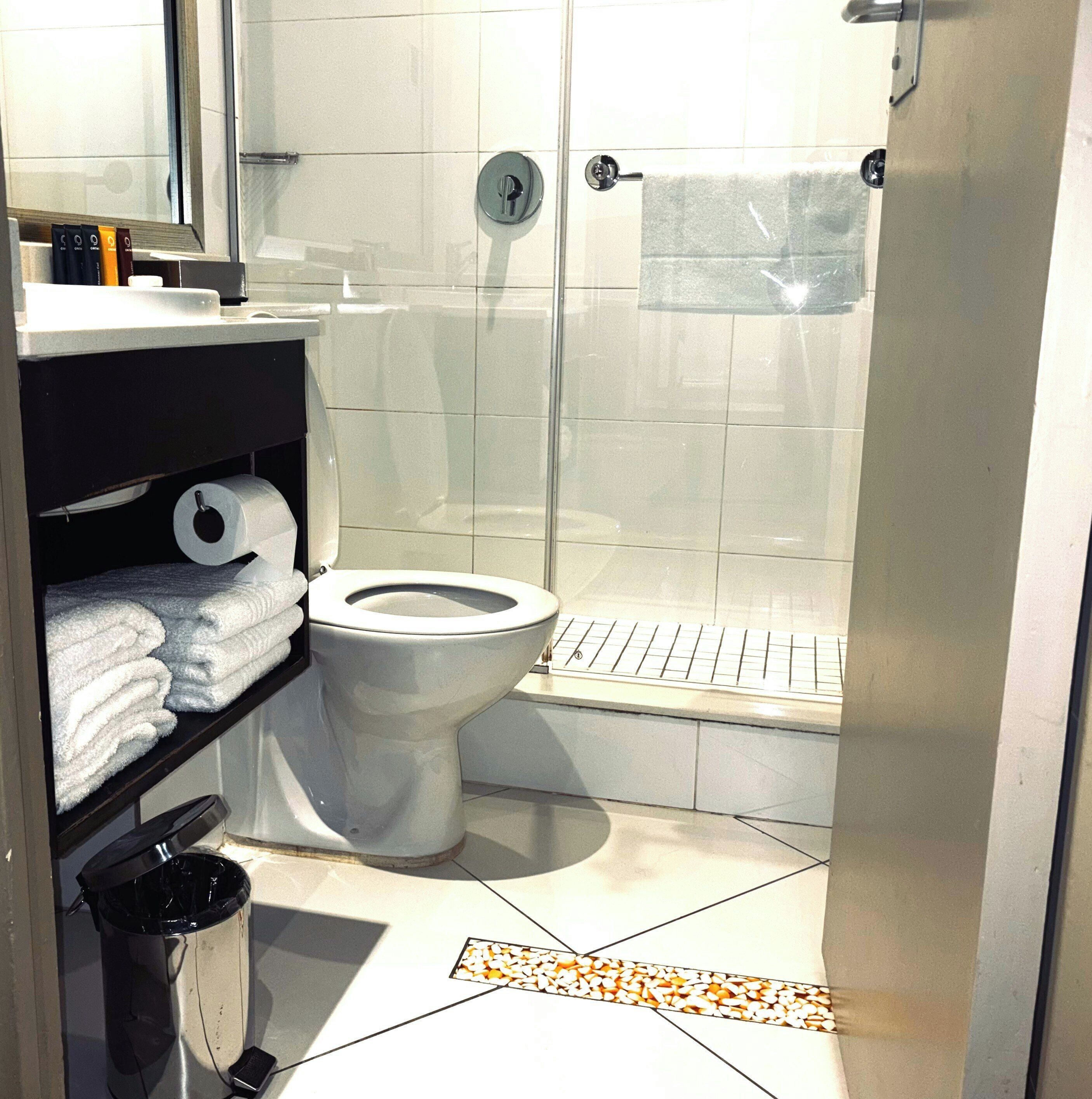 Shower, free toiletries, hair dryer, towels