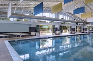 Indoor pool, open 10:00 AM to 7:00 PM, pool umbrellas, pool loungers