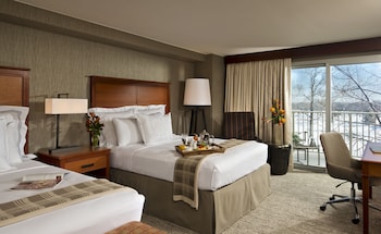 Premium bedding, pillowtop beds, in-room safe, desk at Eaglewood Resort and Spa
