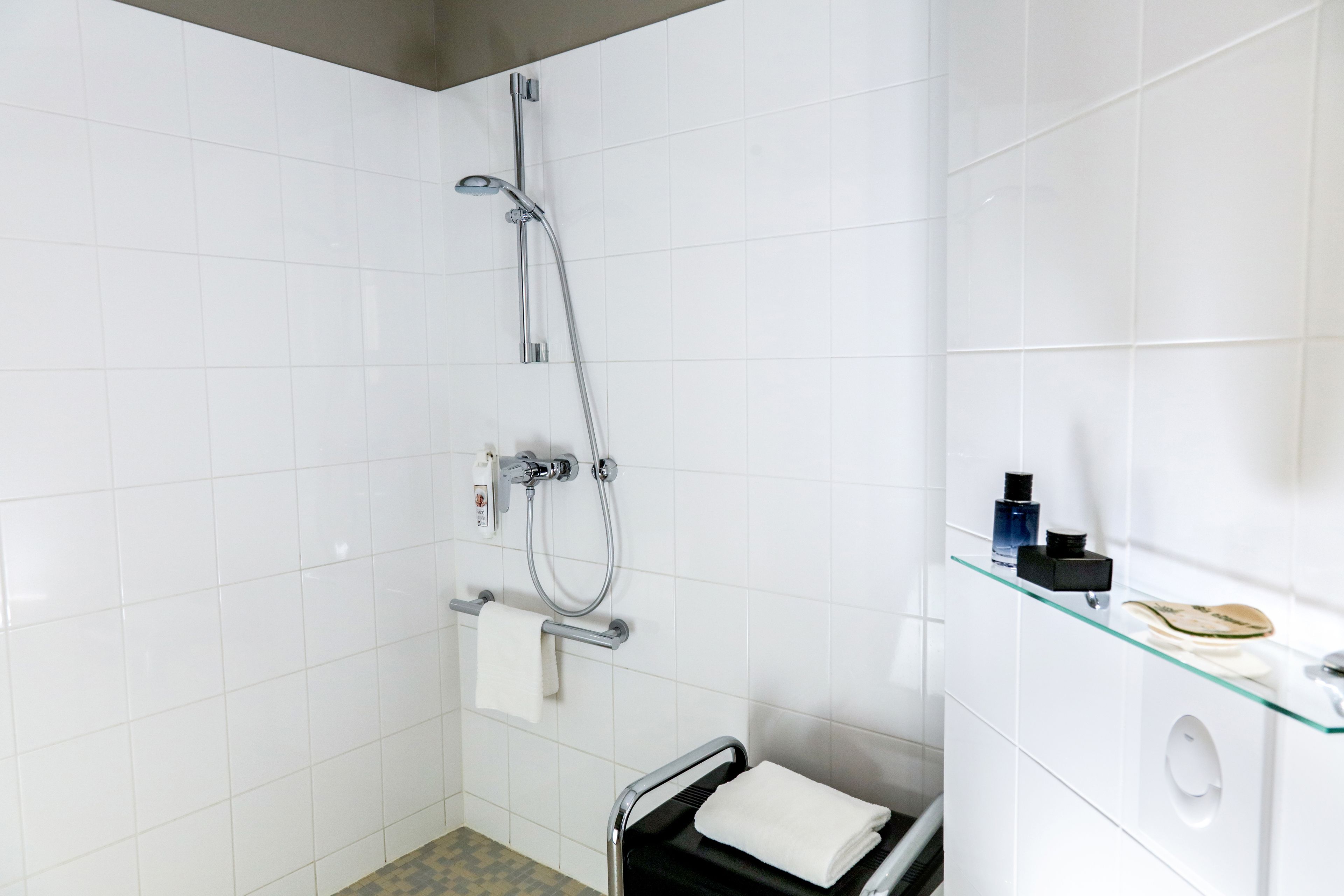 shower, eco-friendly toiletries, hair dryer, towels