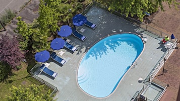 Outdoor pool, pool umbrellas, pool loungers