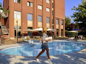 Outdoor pool, pool umbrellas, pool loungers