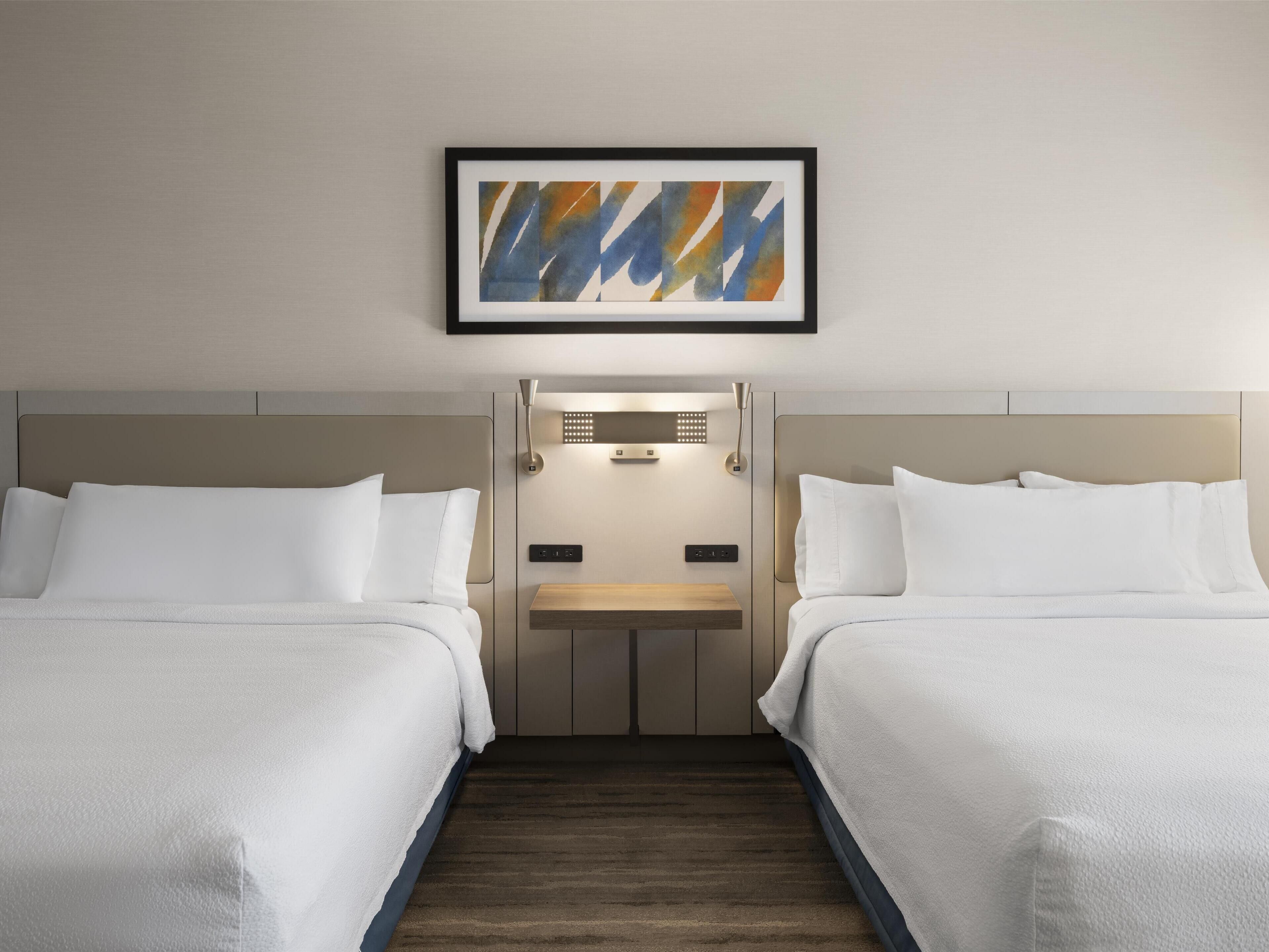 Hypo-allergenic bedding, in-room safe, desk, blackout curtains