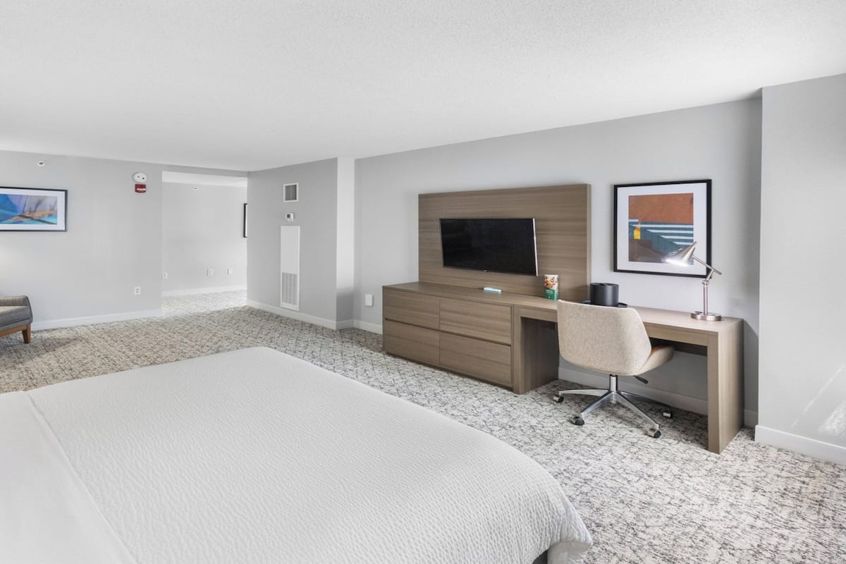 Suite, 1 King Bed with Sofa bed | In-room safe, desk, laptop workspace, iron/ironing board